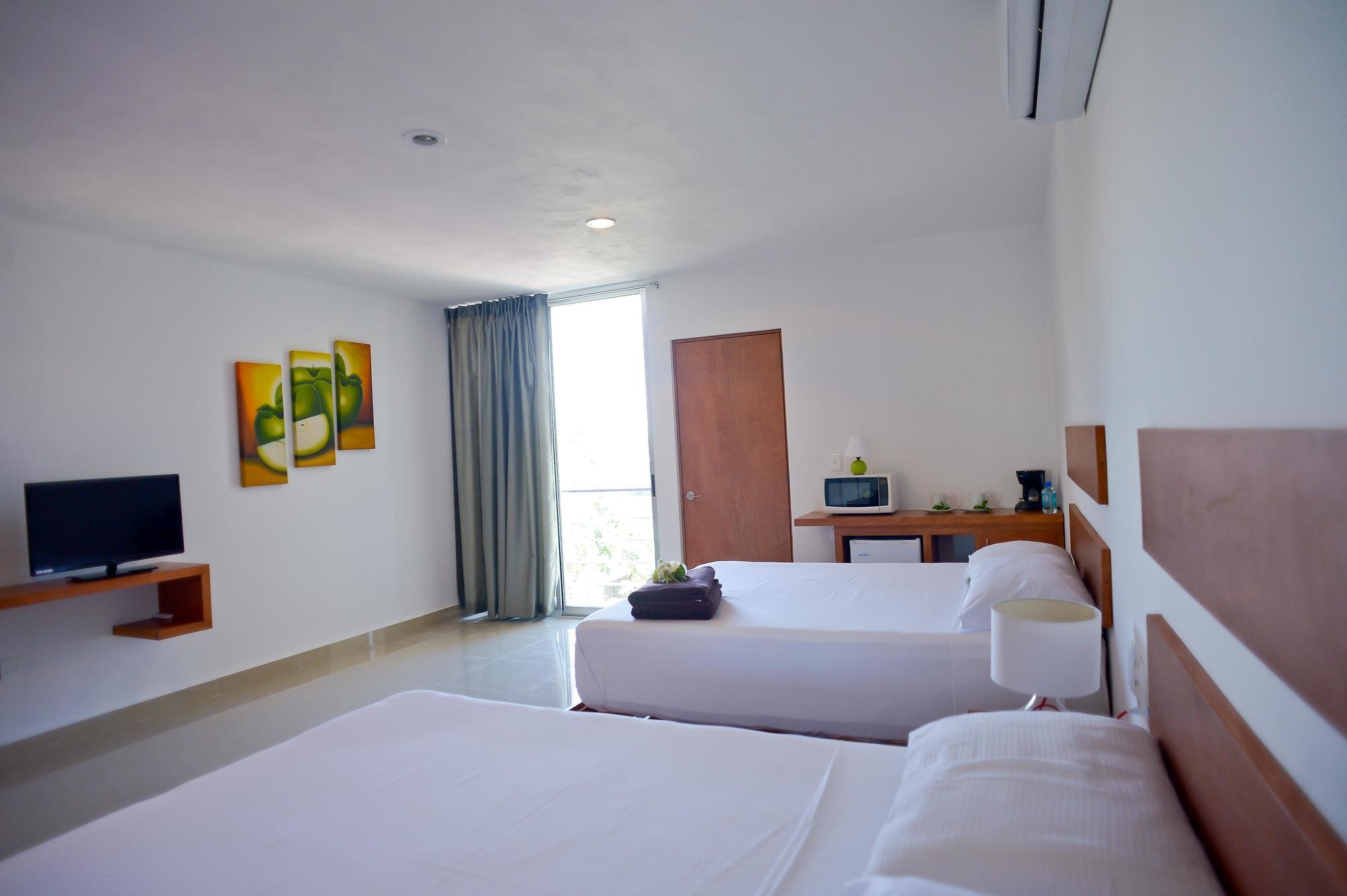 פלאייה דל כרמן Sunrise 42 Suites Hotel מראה חיצוני תמונה